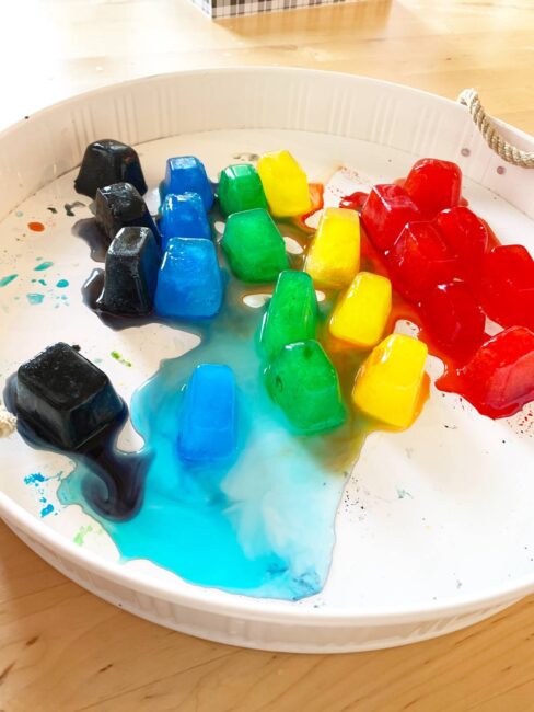 This rainbow ice sensory play is easy, low prep, and can keep your toddlers and preschoolers busy for quite some time while learning colors.