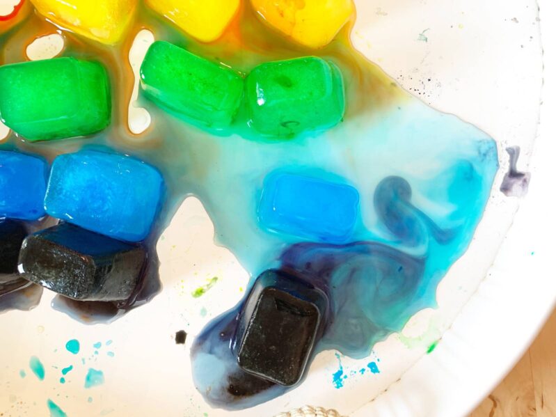 melting and color blending with rainbow ice sensory play