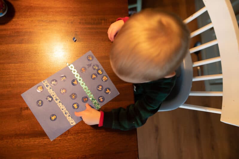 Simplest toddler fine motor and tactile busy activity yet with stickers and tape sticking. Easily modify to teach colors or just have fun!
