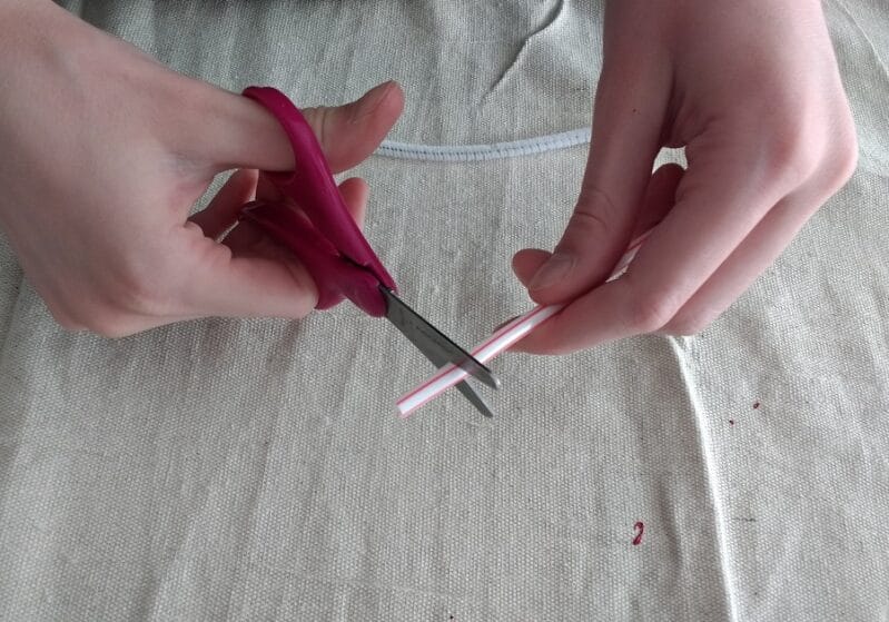 cutting straws for a simple straw pipe cleaner headband or necklace