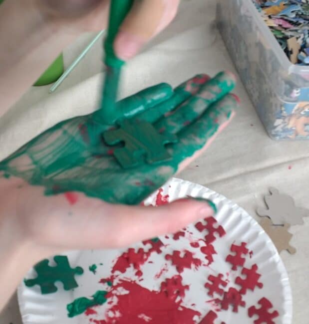 my daughter found it messy to paint the pieces on her hand.