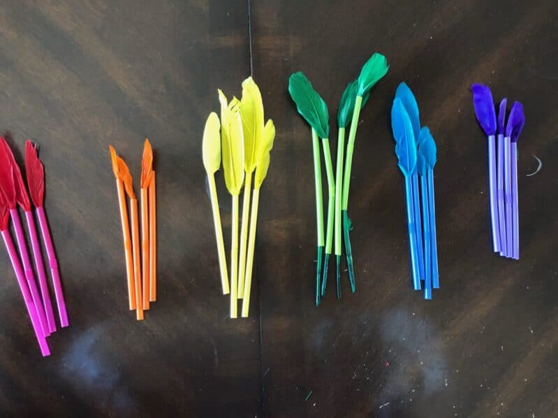 Simple feather and straws color matching threading activity for toddlers and preschoolers at home.