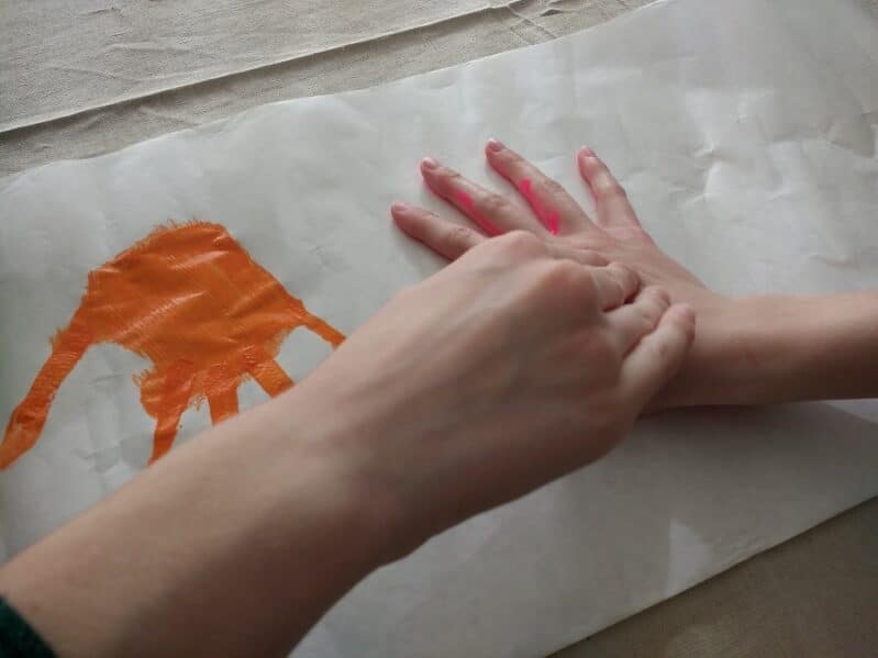 press the hand fully onto the paper. You can fill in holes of the hand after.