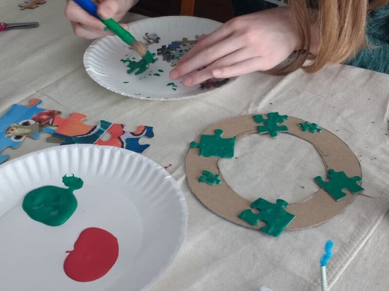 Painting Puzzle Pieces for Christmas Wreath
