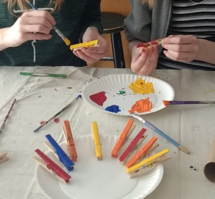 Painting clothespins for thankful Thanksgiving turkey craft