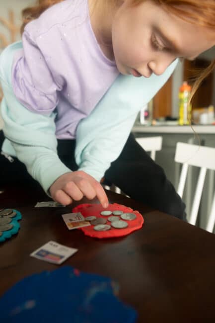 Big Kid counting exact money value game that is super simple and adaptable for any age!