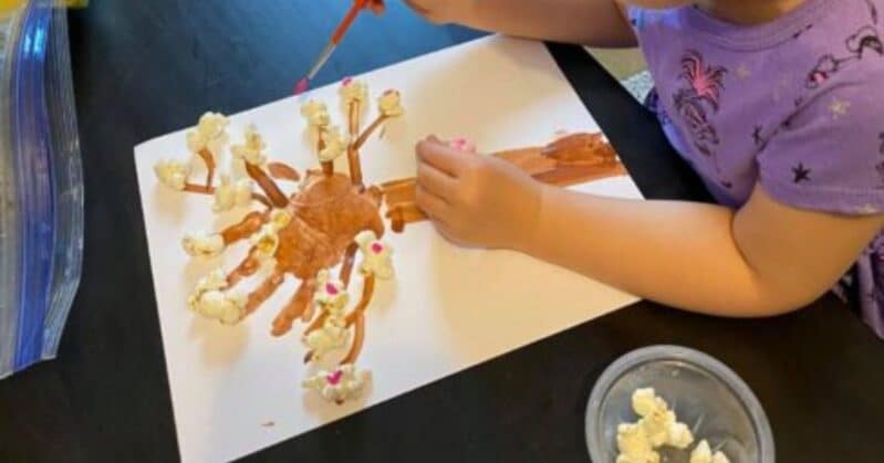 Toddlers and preschoolers will love to get sensory with this super simple cherry blossom spring tree craft. Bonus, enjoy a little snack too while you get creative!