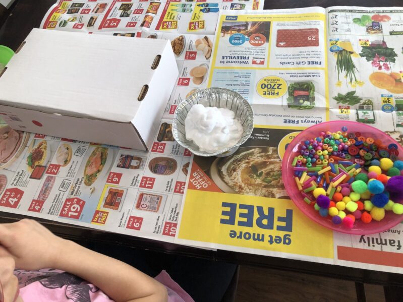 Make your own birthday cakes with shaving cream, food coloring, craft bits and a box! This sensory activity is a perfect activity for a little messy pretend play at home.