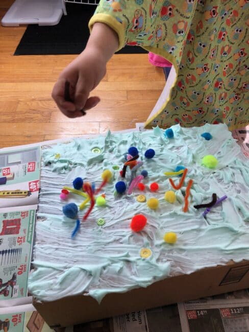 Get creative with a simple shaving cream sensory box cake activity for pretend play and messy fun inside using household supplies! Go for it!