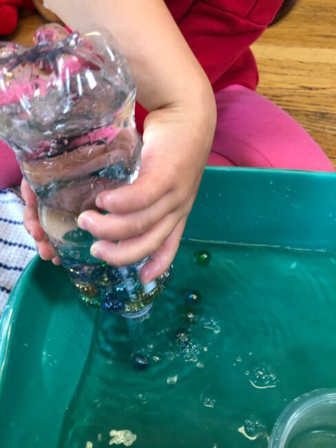 This marble sensory activity is perfect for free play for preschoolers to stay busy and quiet while improving fine motor. Bonus, zero-prep!