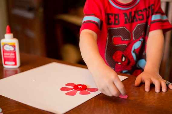 Start out by sorting one color onto the paper and then glue it all down. This is excellent fine motor skills practice for little ones