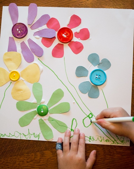 Teach preschoolers colors with this simple hands-on spring flower color match activity and craft that is so easy to do at home with your kids.