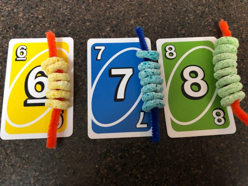 Another way you could vary this activity, is to match up the colours of the cards and the Fruit Loops. 