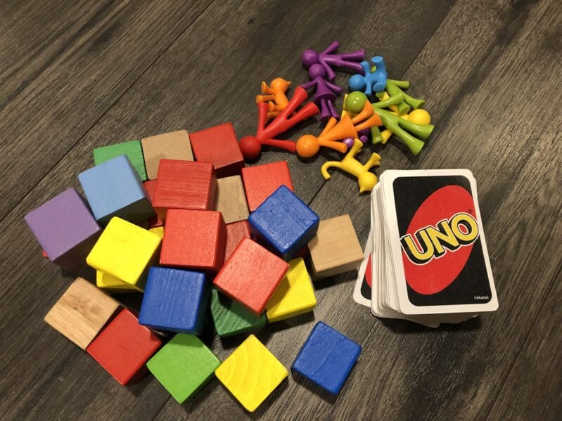 Playing with uno cards and blocks is a great building and counting activity!