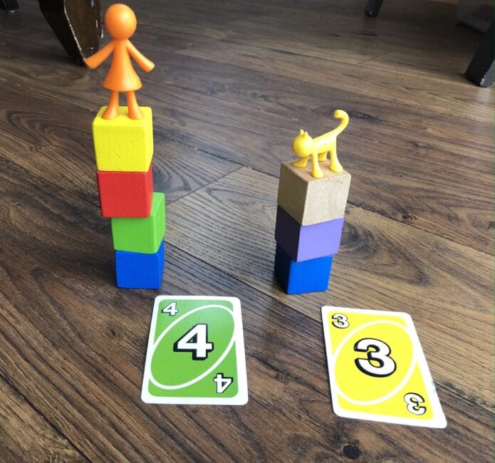 Simple game to play with uno cards and blocks.