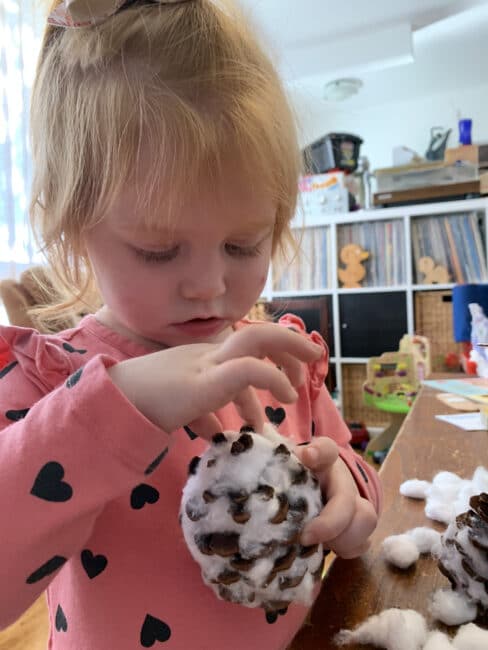 These super cute snowy owl pinecone crafts are so easy to make and a great activity for fine motor  practice for toddlers and preschoolers!