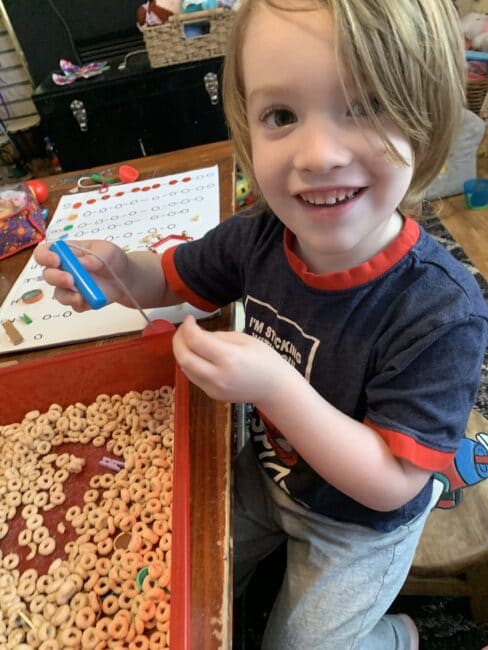 Quick sensory bin stem activity with magnets for preschool kids to work on sorting, counting, and just a lot of fun playing with small parts.
