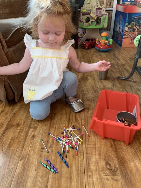 Teach color recognition to toddlers at home with this simple color matching activity with straws and cotton swabs that’s perfect for 2 year olds.