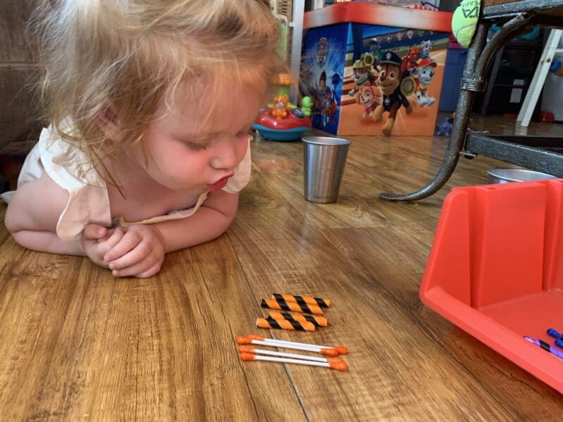 Teach color recognition to toddlers at home with this simple color matching activity with straws and cotton swabs that’s perfect for 2 year olds.