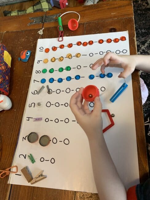 Super simple sensory science activity for preschoolers that adds a magnet aspect of fun as well as sorting categories and counting too!