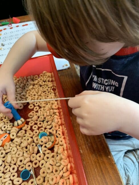 Perfect stem activity for preschoolers to practice sorting and counting with a fun magnet sensory bin that uses supplies from around the house.