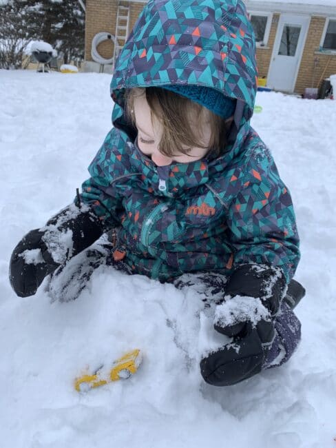 Finding treasure outside in the snow