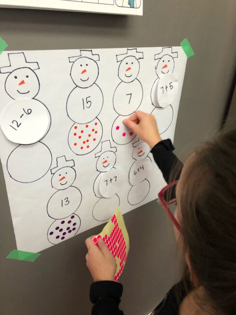 Make math exciting with a snowman scavenger hunt to match numbers and counting with stickers! Fine motor and gross motor in one activity! Win win!
