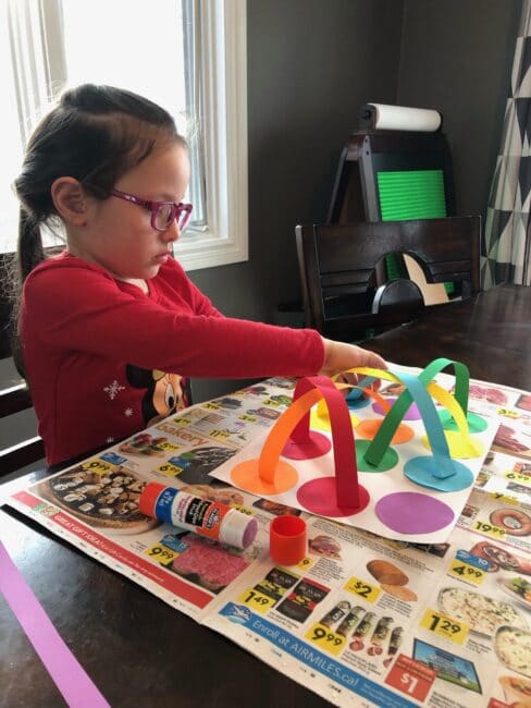 Matching colors, fine motor practice, and creating a simple craft all in one simple kids worriedness that just needs paper, scissors and glue!