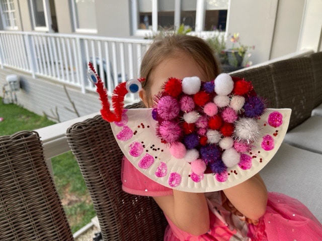 Spread love this spring with an adorable and super simple pom pom and paper plate heart snail craft for toddlers and preschoolers to make.