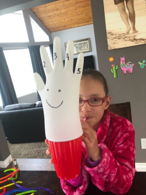 Turn a latex or vinyl glove into a super simple and funny balloon activity! Bonus, blowing activities actually improve speech skills for kids!