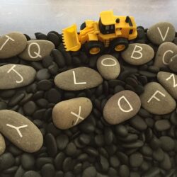Pebbles and Rocks Sensory Bin - Modern Preschool