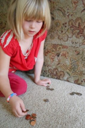 Coin Toss Game for teaching kids about money