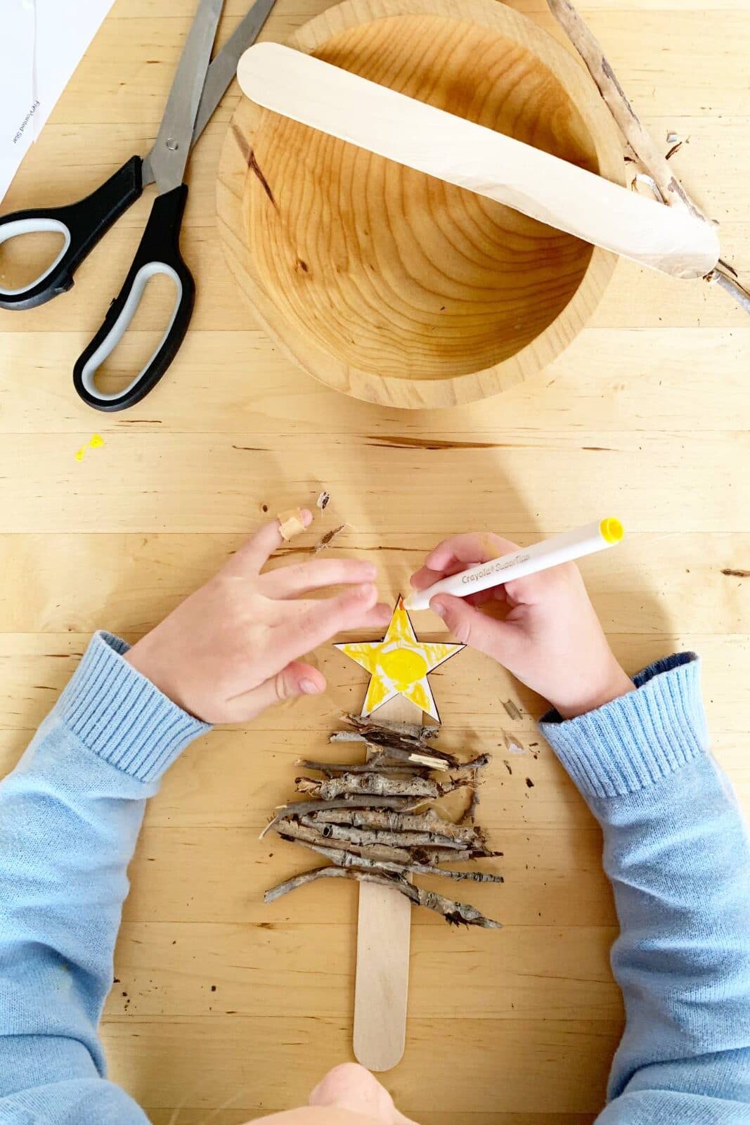 Create a rustic stick tree ornament keepsake craft for kids.