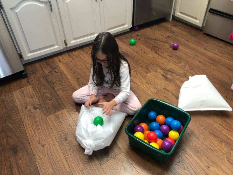 Name the colors, count the balls, or just have silly popping fun with this quick prep game that is sure to get laughs and wear the kids out.