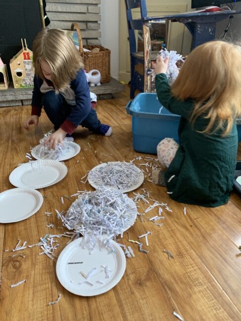 Grab your shredded paper from the office and turn it into an exciting snowman sensory bin experience for toddlers and preschoolers at home.