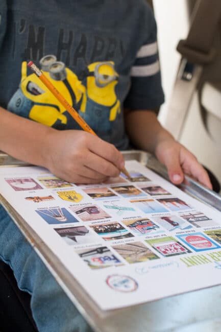 Beat car boredom together on your next vacation with a picture scavenger hunt style bingo game that’s perfect for road trips with the family!