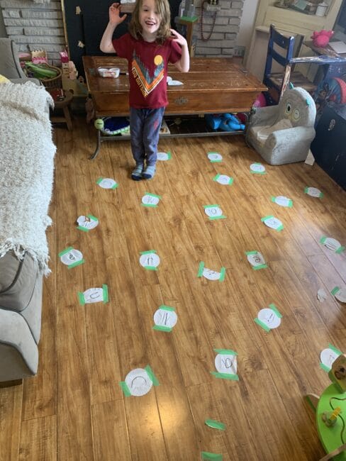 Jump, roll, hop, or spin your way to spell your name over and over with a big connect the letters game for preschoolers!