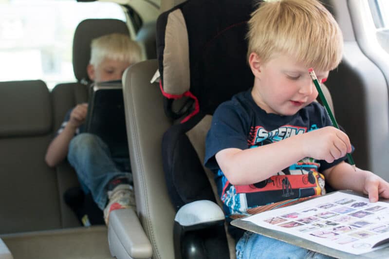Beat car boredom together on your next vacation with a picture scavenger hunt style bingo game that’s perfect for road trips with the family!