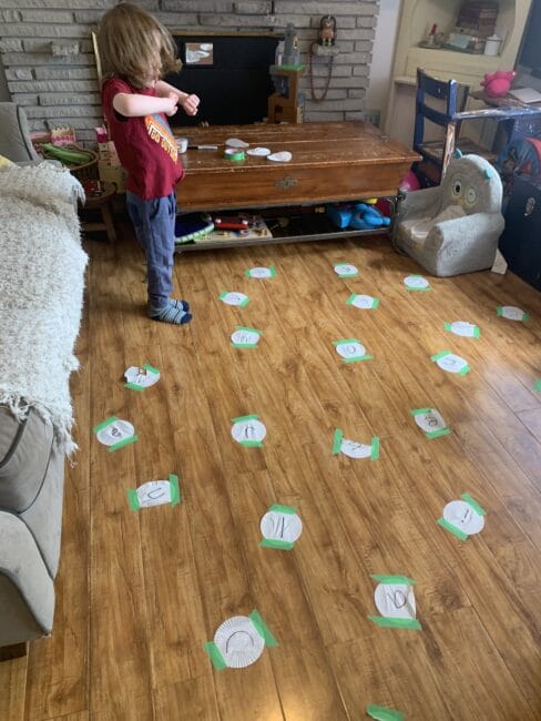 Jump, roll, hop, or spin your way to spell your name over and over with a big connect the letters game for preschoolers!