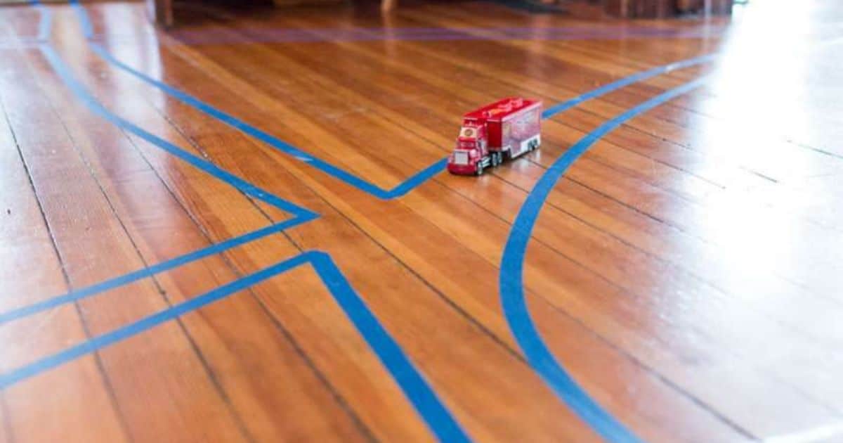 Use colored masking tape to create a road on the floor. Make a carwash from  a cardboard box. Endless play! Great fo…