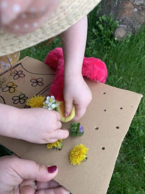 Strengthen and develop fine motor skills with a super simple and cute wild flower bouquet activity for toddlers and preschoolers to enjoy outdoors.
