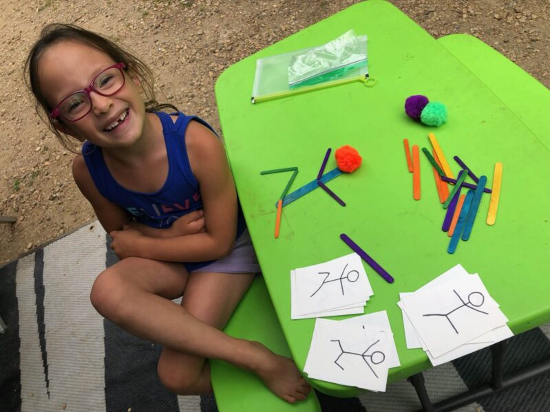 Your preschoolers can work on fine motor, visual discrimination, and early drawing skills with a simple stick men activity using craft sticks, paper, markers, and pom poms.