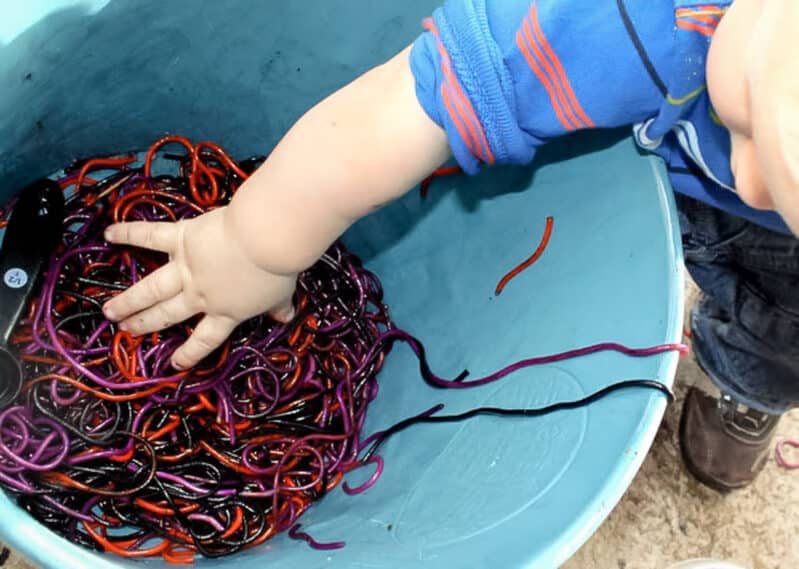 A cauldron for a spaghetti slime sensory activity for toddlers