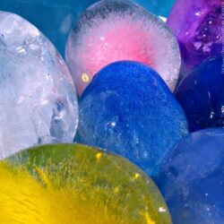 Glittery Frozen Water Balloon Sensory Bin – Where Imagination Grows