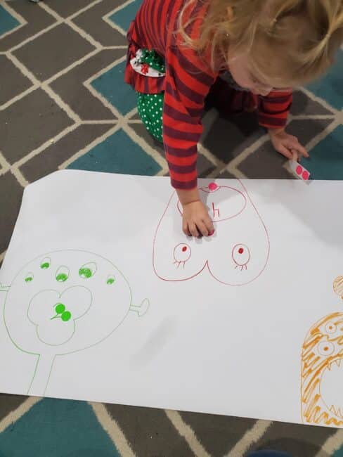 This monster math activity is great for building number recognition and using one-to-one correspondence (counting one item per number) as your toddlers and preschoolers feed monsters with stickers!