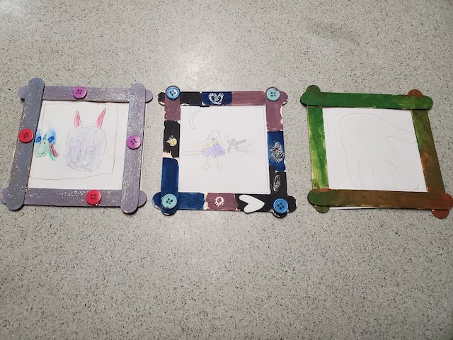 popsicle stick frames with children's artwork
