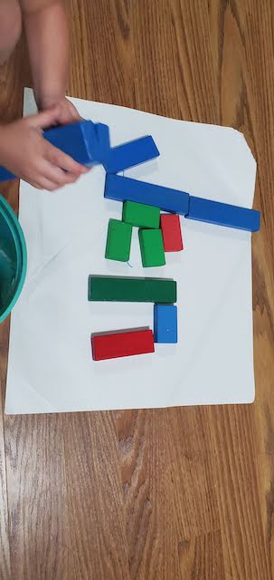name tracing practice with wooden flat blocks