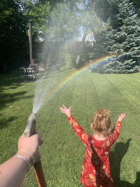 Use a garden hose to create rainbows for a simple science experiment in your own backyard.