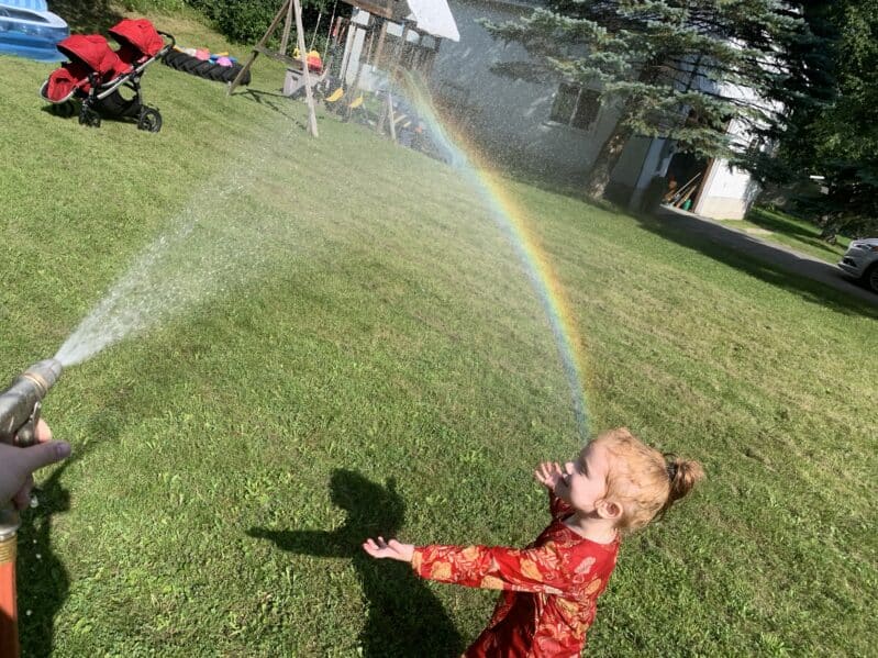 Use a garden hose to create rainbows for a simple science experiment in your own backyard.