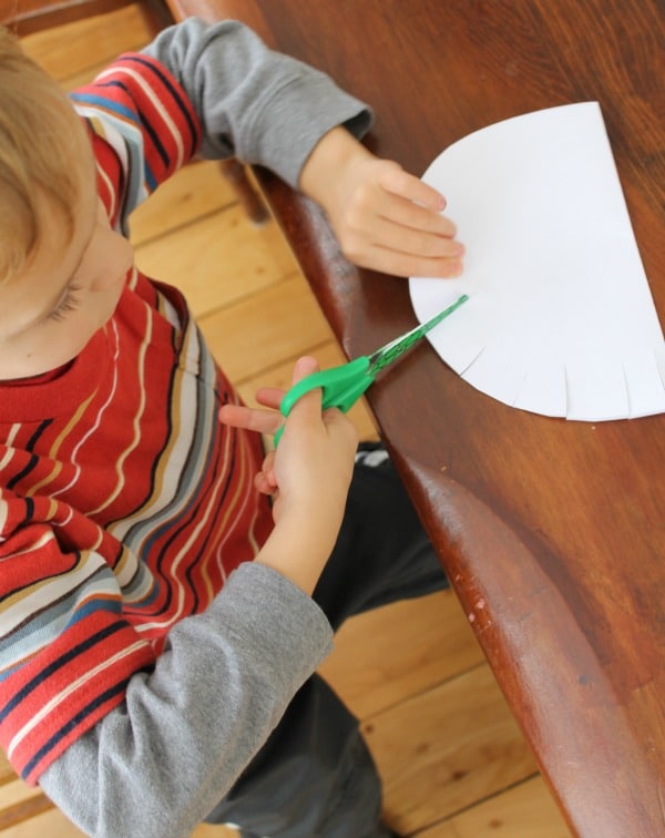 Cutting practice with a Santa craft for preschooler to make